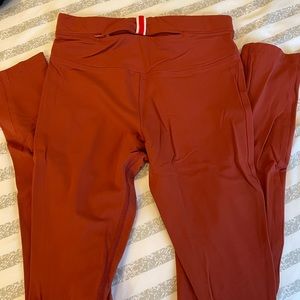 Tracksmith turnover tights, women’s small. Burnt orange, like new